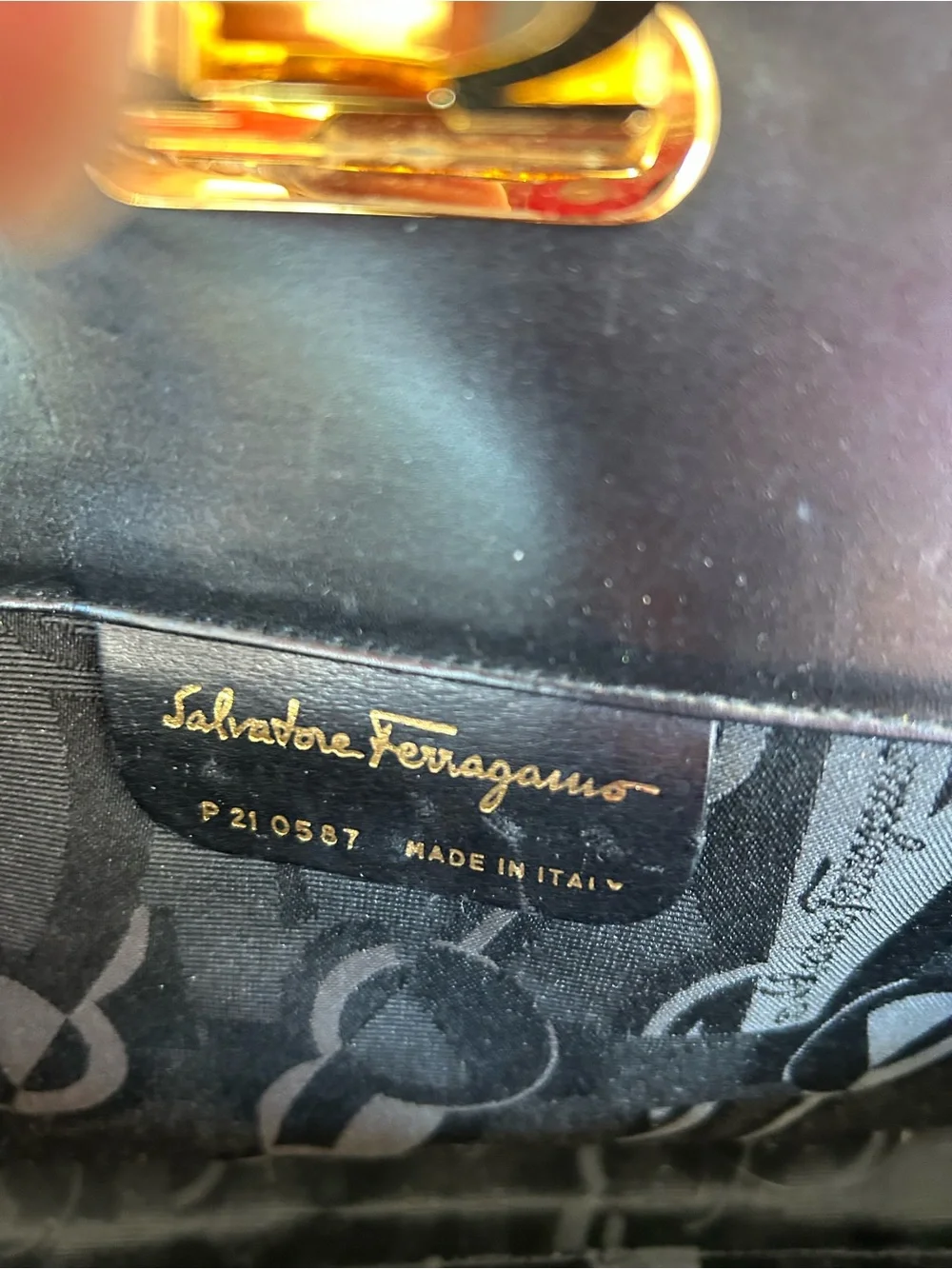 Salvatore Ferragamo Black Leather Clutch with Gold Ring Detail
